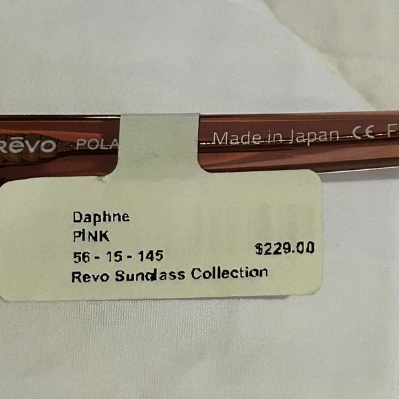 Revo Daphne  Sunglasses - Crystal Mauve frame/Champagne lenses. New. main image 5